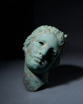 A LIFE SIZE BRONZE BUST OF APHRODITE, PROBABLY GRAND TOUR OR EARLIER