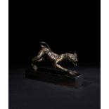 A RARE GILT BRONZE HELLENISTIC STATUETTE OF A HOUND, CIRCA 2ND-1ST CENTURY BC