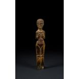 A ROMANO-EGYPTIAN BONE FEMALE FIGURE 3RD-4TH CENTURY A.D.