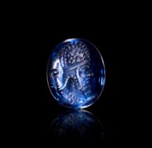 A BLUE SAPPHIRE INTAGLIO DEPICTING AN ISLAMIC RULER