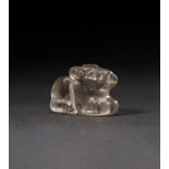 A GREEK ROCK CRYSTAL AMULET OF A RECUMBENT BULL, CIRCA 5TH CENTURY A.D. OR LATER