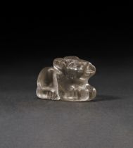 A GREEK ROCK CRYSTAL AMULET OF A RECUMBENT BULL, CIRCA 5TH CENTURY A.D. OR LATER