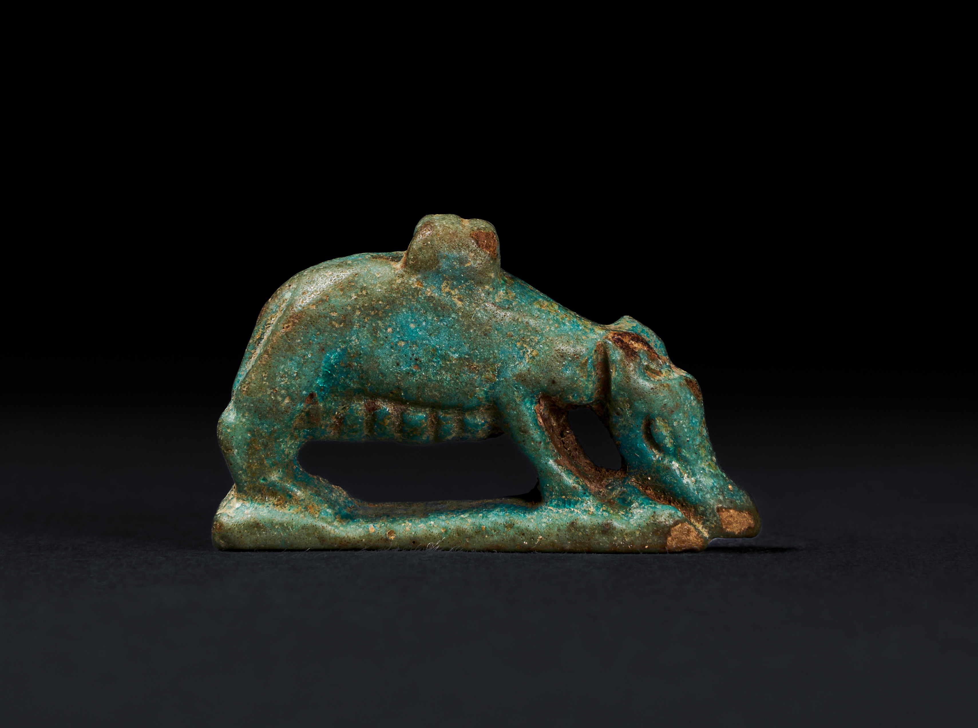 AN EGYPTIAN FIANCE AMULET OF THE SKY GODDESS NUT AS A SOW, 3RD INTERMEDIATE PERIOD, CIRCA 1085-760 B