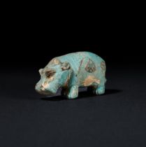 AN EGYPTIAN FAIENCE HIPPOPOTAMUS LATE PERIOD, DYNASTY XXVI, 664-525 B.C.