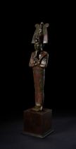 A LARGE EGYPTIAN BRONZE FIGURE OF OSIRIS LATE PERIOD-EARLY PTOLEMAIC PERIOD, CIRCA 664-150 B.C.