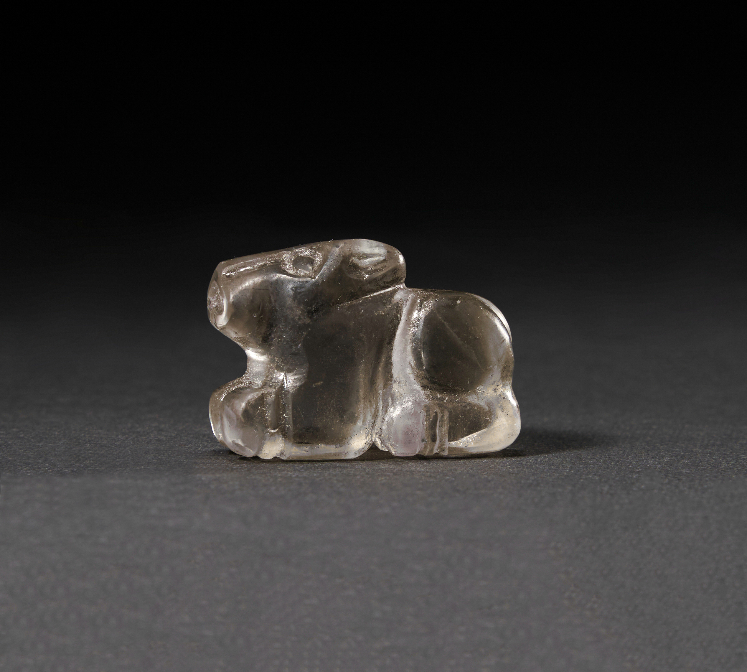 A GREEK ROCK CRYSTAL AMULET OF A RECUMBENT BULL, CIRCA 5TH CENTURY A.D. OR LATER - Image 2 of 2