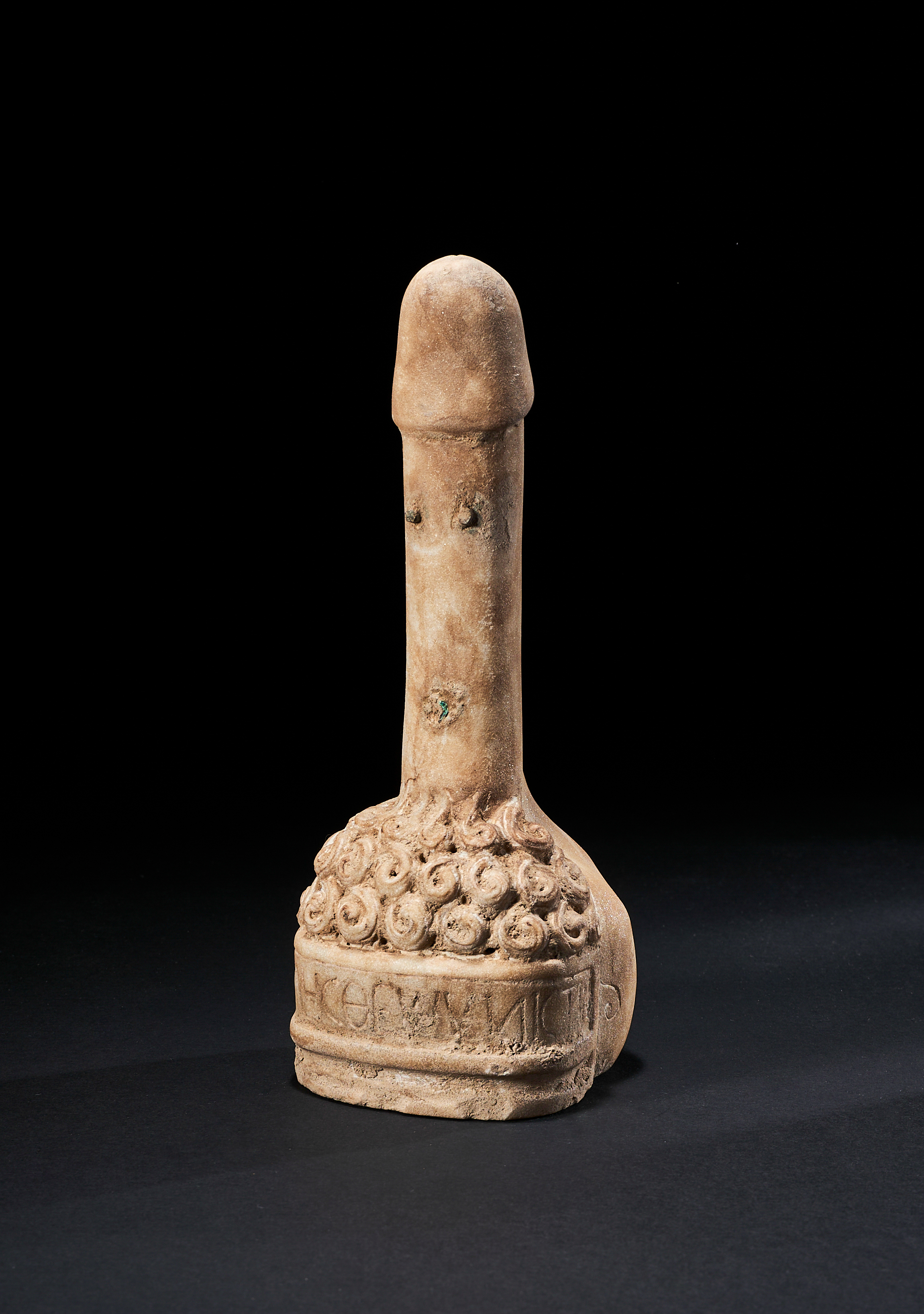 A GREEK INSCRIBED MARBLE PHALLUS, CIRCA 1ST CENTURY A.D.