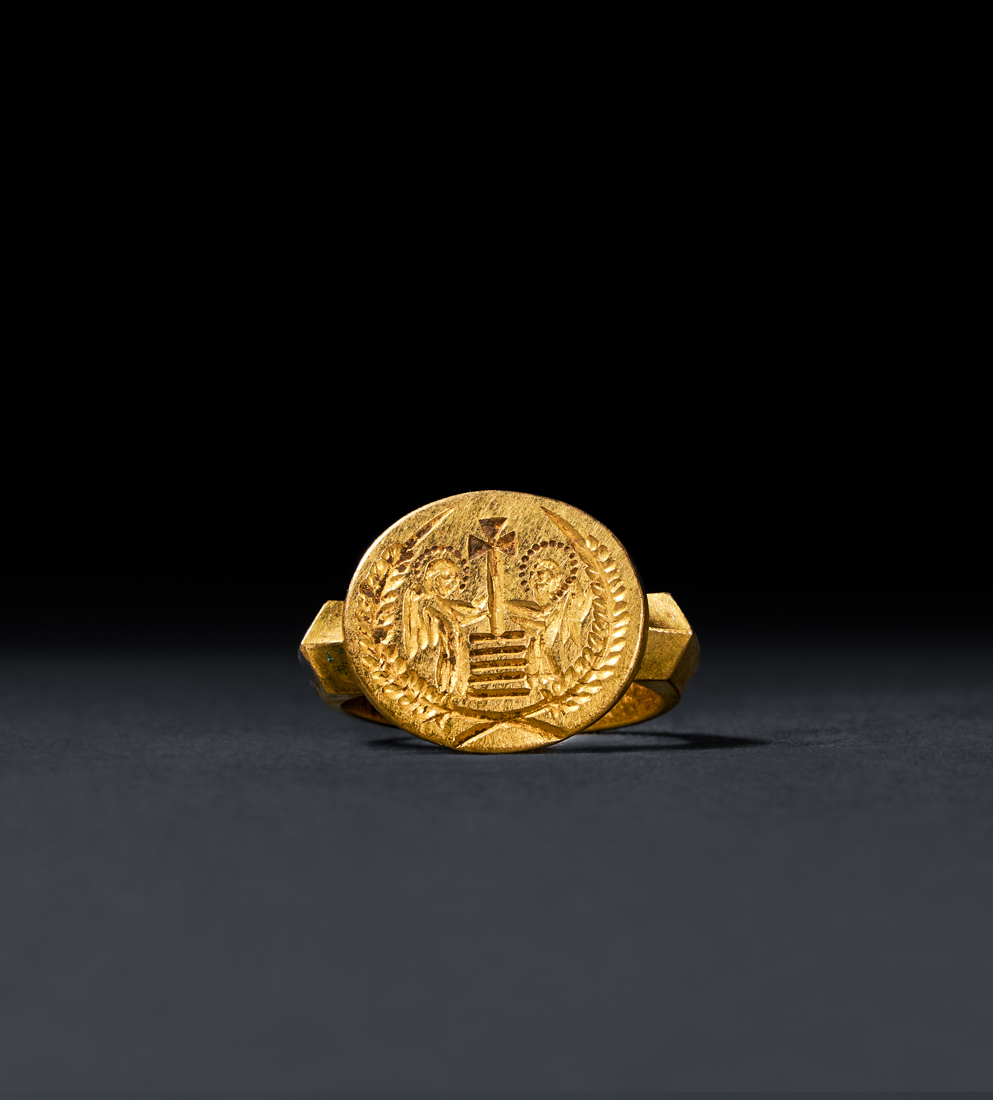 A BYZANTINE GOLD MARRIAGE FINGER RING CIRCA 6TH-7TH CENTURY A.D.