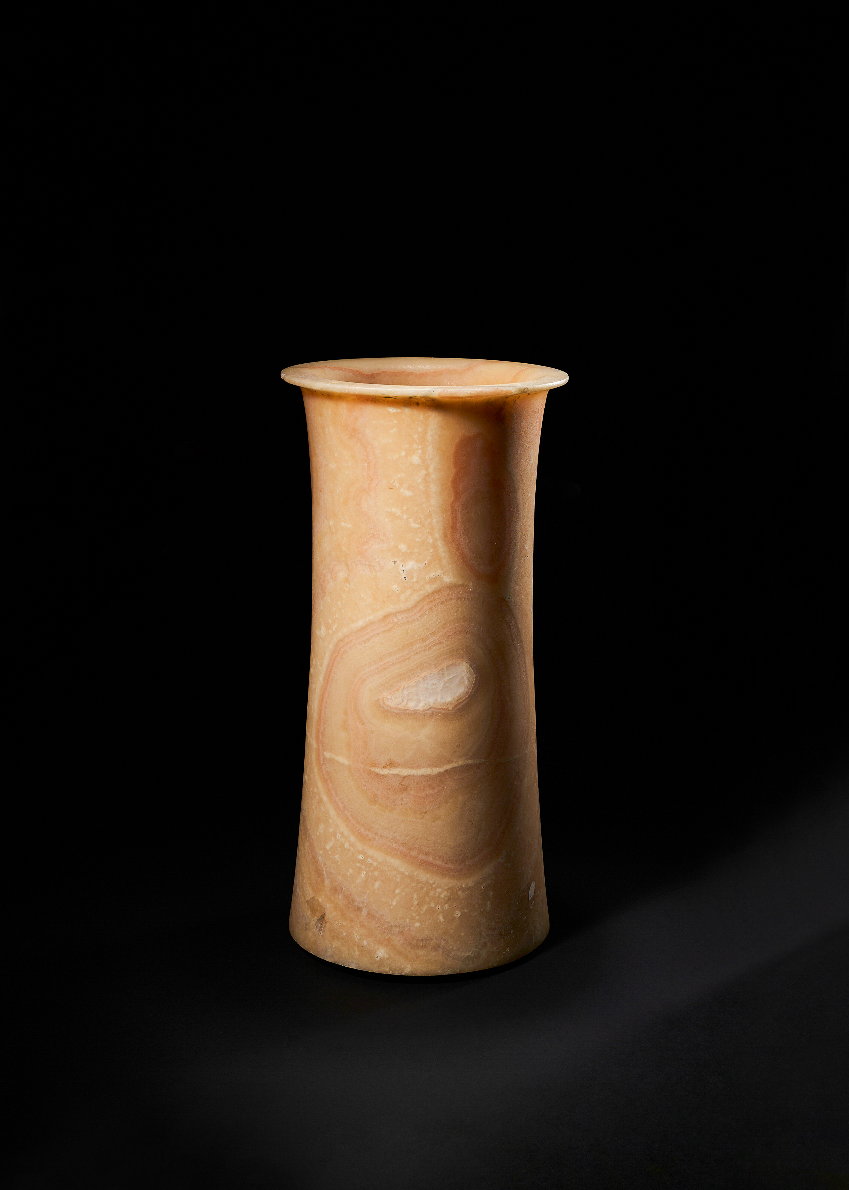 AN EGYPTIAN CALCITE-ALABASTER VESSEL EARLY DYNASTIC PERIOD OR LATER