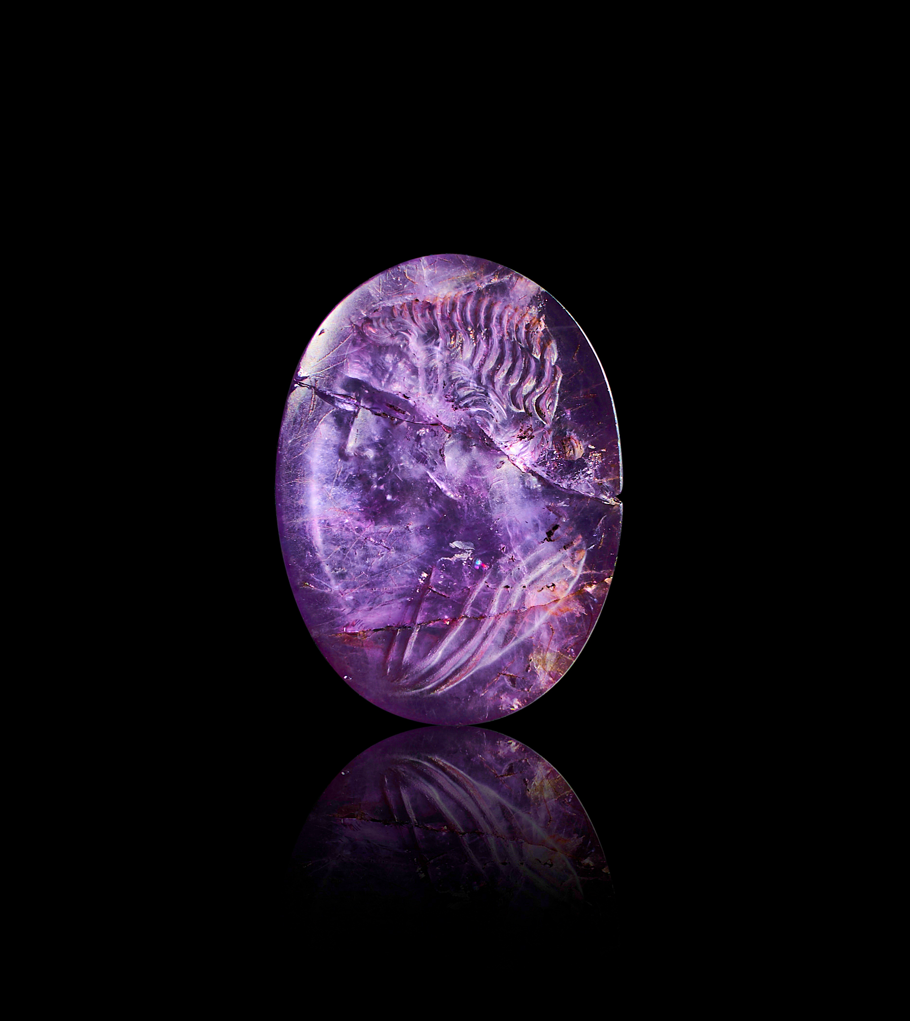 A GREEK AMETHYST RINGSTONE DEPICTING ATHENA HELLENISTIC PERIOD, CIRCA 1ST CENTURY B.C.