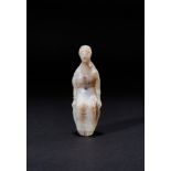 A HELLENISTIC CHALCEDONY FIGURE OF A RESTING FEMALE, CIRCA 3RD-2ND CENTURY B.C.