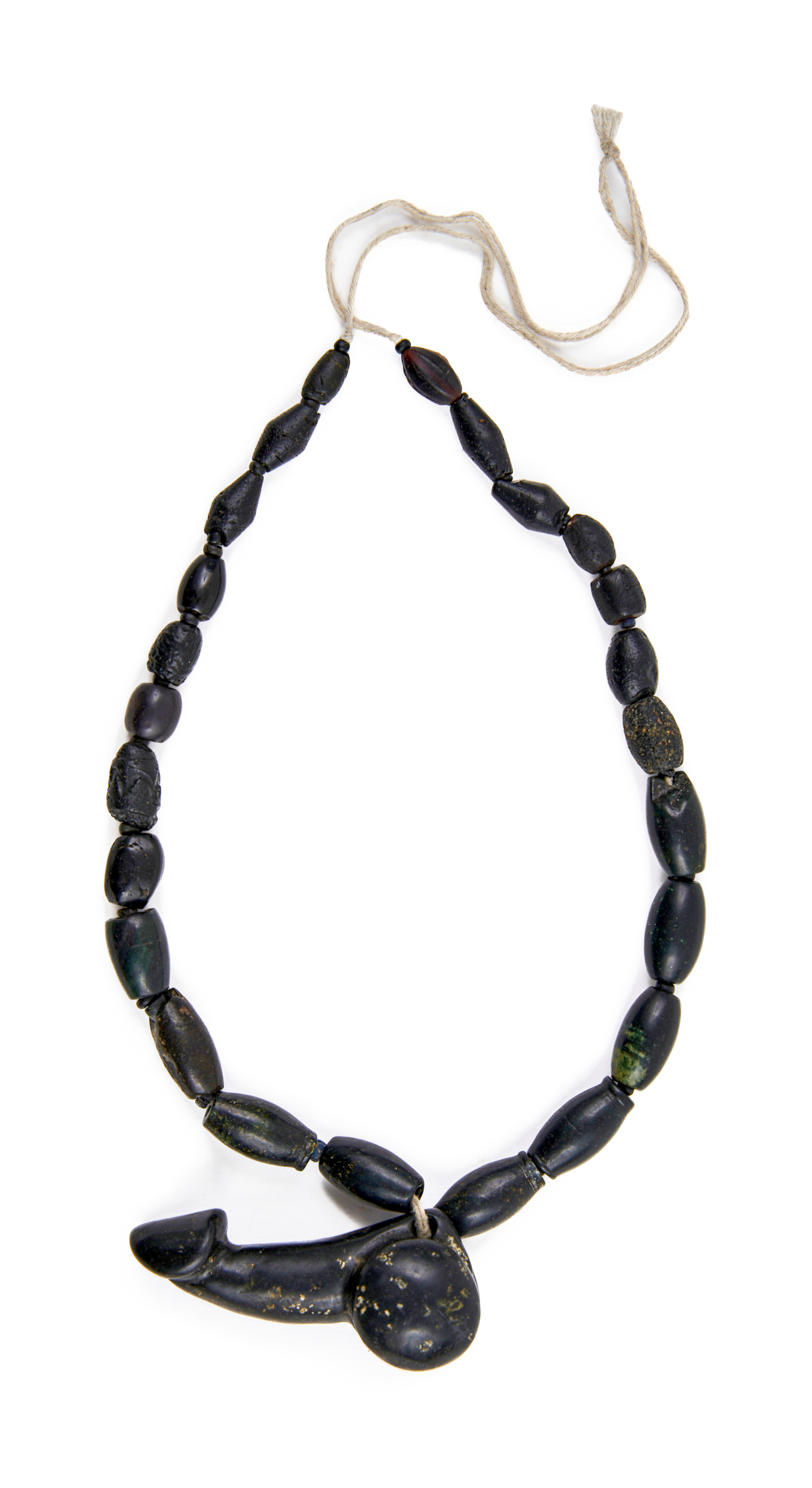 A GREEK BLACK STONE PHALLUS NECKLACE