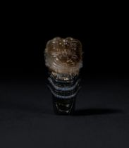 A NEO-ASSYRIAN BANDED AGATE HEAD OF PAZUZU CIRCA 8TH-7TH CENTURY B.C. Height: