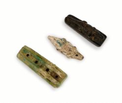 THREE EGYPTIAN CROCODILE AMULETS, LATE PERIOD TO ROMAN PERIOD, CIRCA 6TH CENTURY B.C.-2ND CENTURY A.