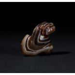 AN ELAMITE BANDED AGATE FELINE IRAN, CIRCA 1200 B.C.