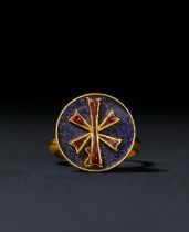 A BYZANTINE GOLD CHI RHO INSCRINED ENAMEL FINGER RING CIRCA 9TH-12TH CENTURY A.D.