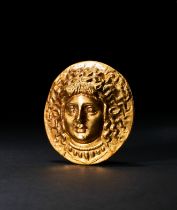 A HELLENISTIC GOLD APPLIQUE OF HERA, HELLENISTIC PERIOD, CIRCA 3RD CENTURY B.C.