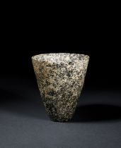 AN EGYPTIAN GRANODIORITE BEAKER, EARLY DYNASTIC PERIOD, DYNASTY I-II, 2920-2649 B.C.