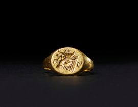 A GREEK INSCRIBED GOLD BULL RING, CIRCA 3RD CENTURY A.D.