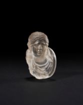 A ROMAN ROCK CRYSTAL TEAR DROP GLASS DEPICTING A MAIDEN, CIRCA 2ND CENTURY A.D.