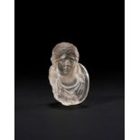 A ROMAN ROCK CRYSTAL TEAR DROP GLASS DEPICTING A MAIDEN, CIRCA 2ND CENTURY A.D.