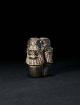 AN UNUSUAL NEO-ASSYRIAN CONJOINED HEMATITE PAZUZU AMULET, CIRCA 8TH-7TH CENTURY B.C.