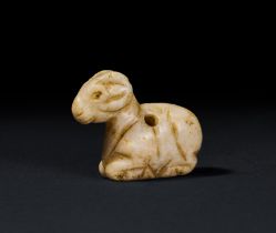 A MESOPOTAMIAN STONE ANIMAL AMULET, JEMDET NASR, CIRCA 3300-2900 B.C.