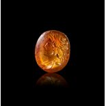 A CARNELIAN INTAGLIO OF A YOUNG EMPEROR, CLASSICAL PERIOD, CIRCA 4TH CENTURY B.C.