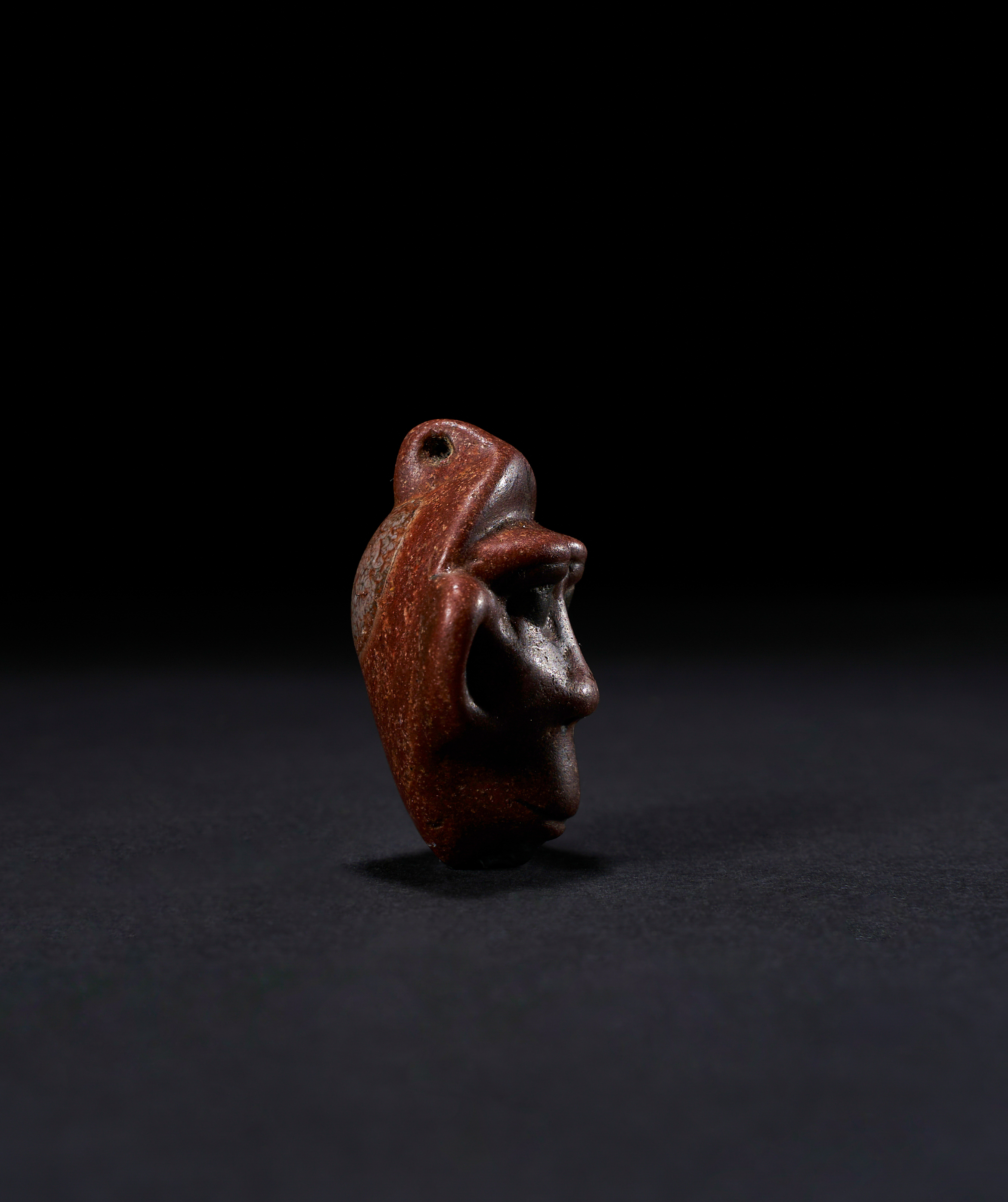 AN EGYPTIAN JASPER BABOON AMULET, NEW KINGDOM, DYNASTY XVIII-XIX, CIRCA 1550-1186 B.C. - Image 2 of 2