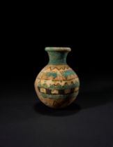 A NORTH-WEST PERSIAN 'ZIWIYE' GLAZED POTTERY JAR 9TH CENTURY B.C.