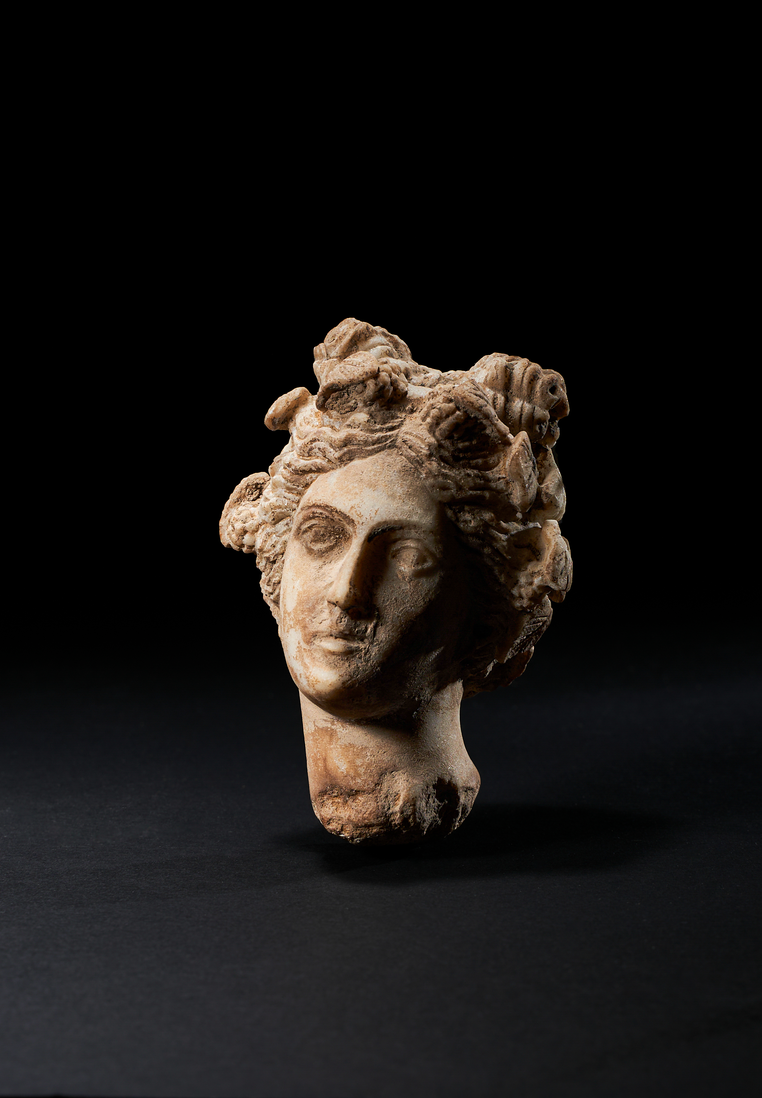 A RARE MARBLE BUST OF APHRODITE, HELLENISTIC, CIRCA 3RD/2ND CENTURY B.C. - Image 2 of 3