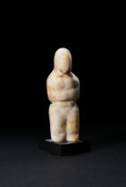 AN ANATOLIAN STONE MOTHER GODDESS NEOLITHIC PERIOD, CIRCA 6TH MILLENNIUM B.C.