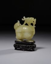 A CHINESE JADE MYTHICAL BEAST CARVING, QING DYNASTY (1644-1911)