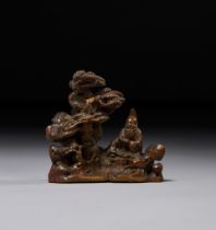 A CHINESE WOOD CARVING BRUSH REST IN THE FORM OF A LANDSCAPE SCENE, QING DYNASTY (1644-1911)