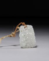 A WHITE JADE AMULET, QING DYNASTY (1644-1911)