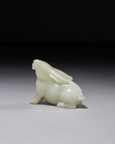 A WHITE JADE RABBIT FIGURE, QING DYNASTY (1644-1911)