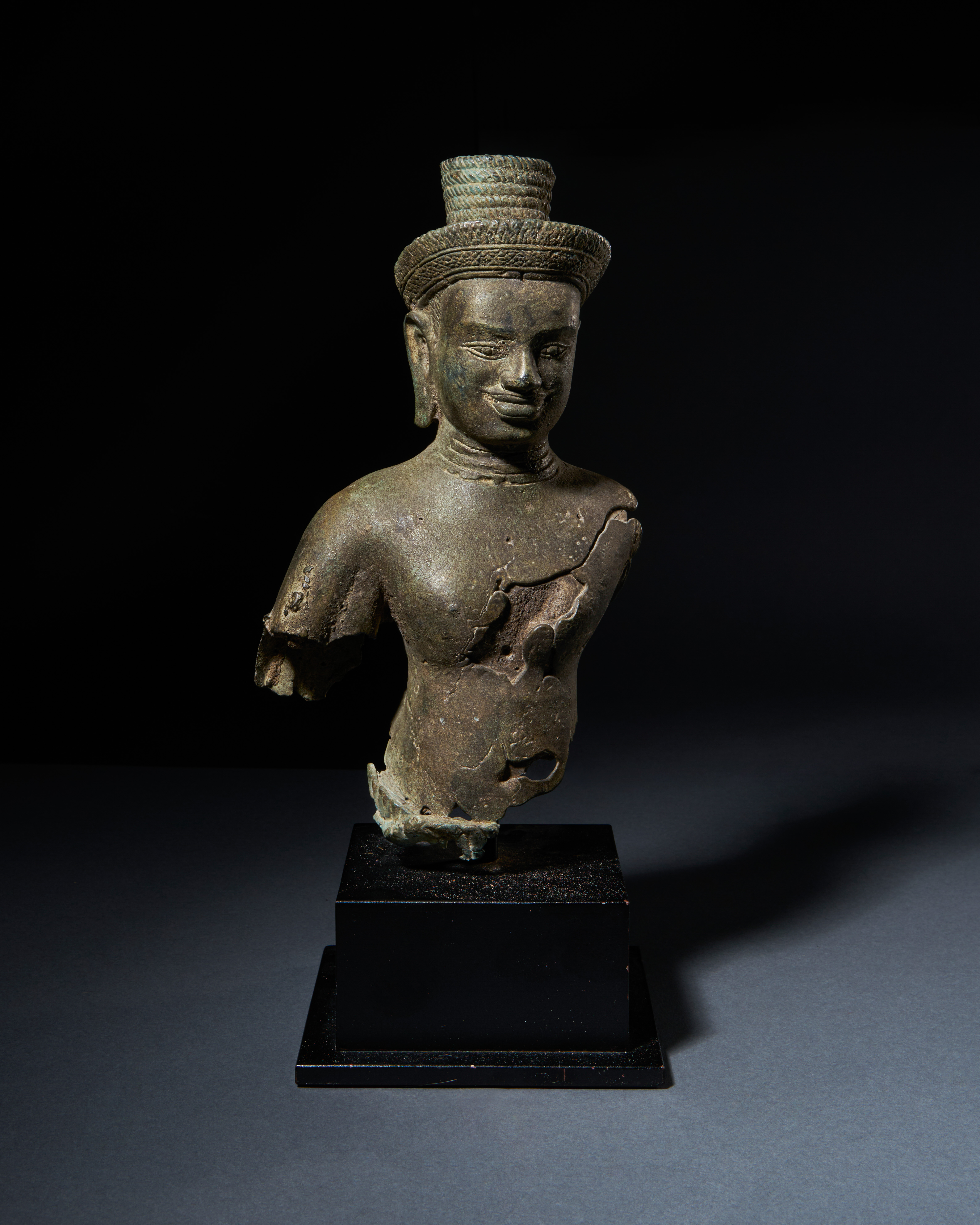 A BRONZE FIGURE OF A DEITY, CAMBODIA, ANGKOR PERIOD