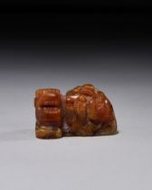 A HARDSTONE OF A MYTHICAL BEAST, POSSIBLY HETIAN JADE, 18TH/19TH CENTURY