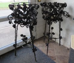 Pair of wrought iron jardinere stands, 33 inches tall.