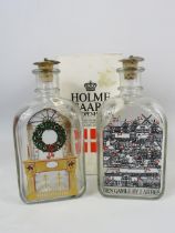 2 Vintage Holmegaard christmas decanters, one has a box. Approx 19cm tall.