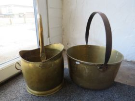 Large heavy brass jam pan with cast iron handle and a brass coal bucket.