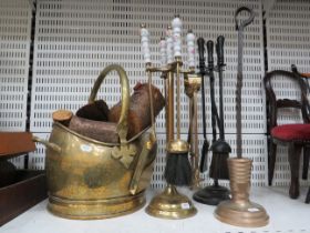 Brass Helmet shaped coal bucket, 2 Companion sets and a poker.