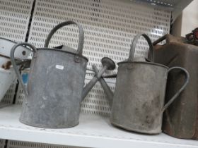 2 Vintage galvanised watering cans.