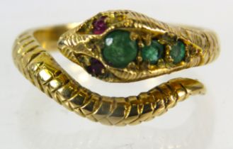 9ct gold Snake ring with ruby eyes and 3 emeralds set to the head, finger size O.5. 5.2grams.