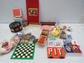 Selection of various vintage games, marbles, playing cards, chess set etc.