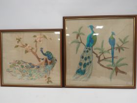 Two Needlepoint pictures of Peacocks in the Oriental style. Both framed and under glass which measur