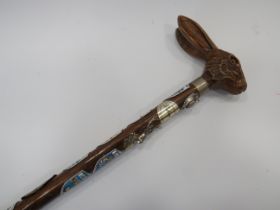 Ramblers Walking Cane with Carved Hare's Head Handle with Glass eyes. Decorated with 10 Metal Scotti