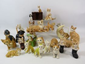 A large selection of various cat figurines some by Leonardo and Sherrat and Simpson.