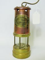 British Coal Mining Company (Wales UK) Brass Miners lamp in excellent condition. Serial number 120