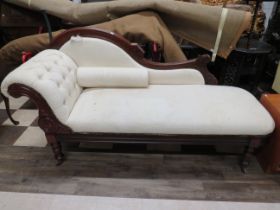 Vintage early 20th Century Chaise in Ivory upholstery with buttoned back rest. Exposed decorative ca